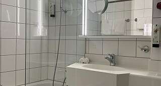 Badezimmer Premium Room mit Balkon Hotel Stockalperhof
